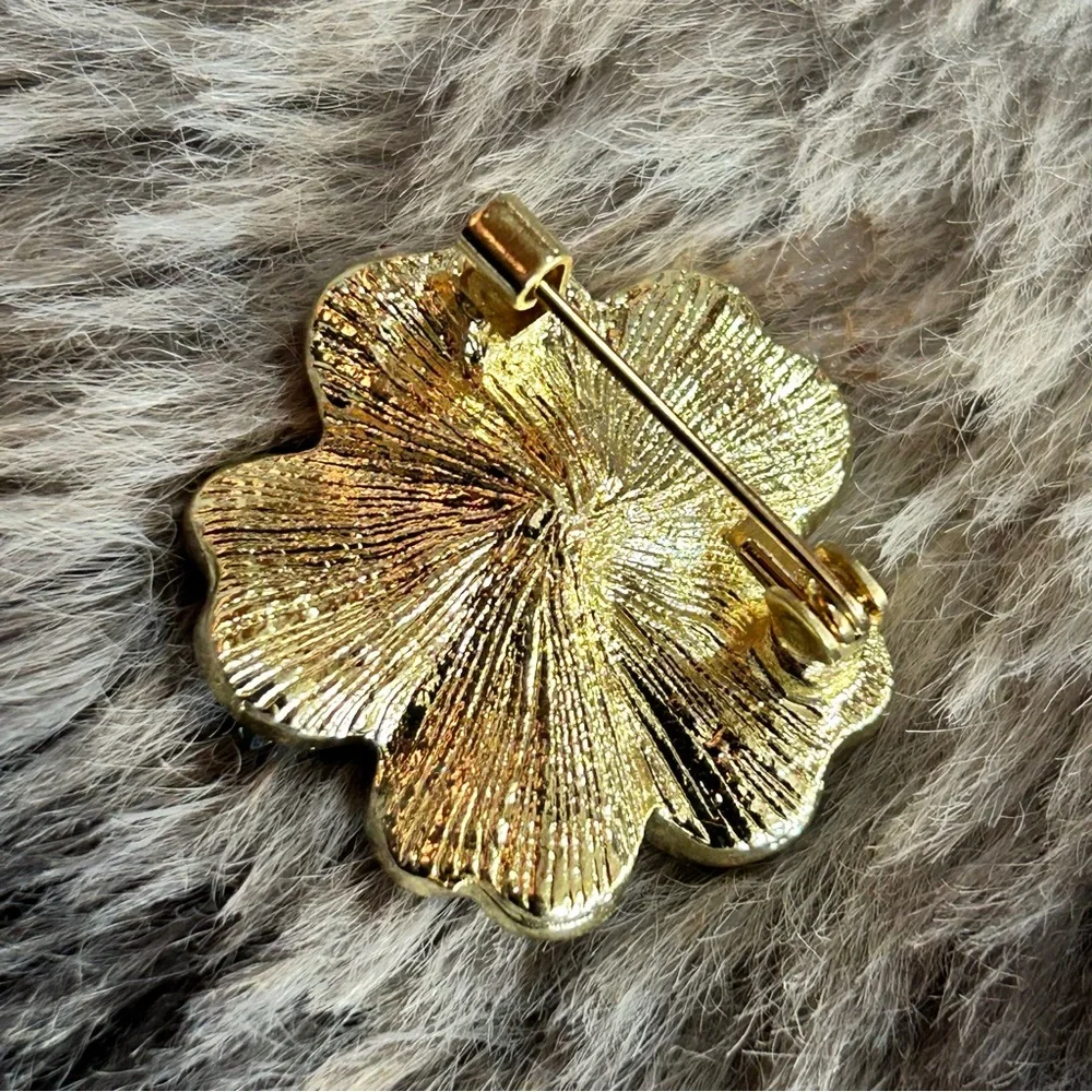 Vintage rough sorcerer stone crystal aurora borealis flower brooch